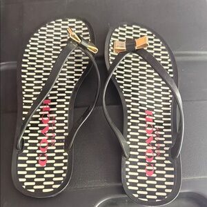 Coach Black Sandals with Gold Bow Accents